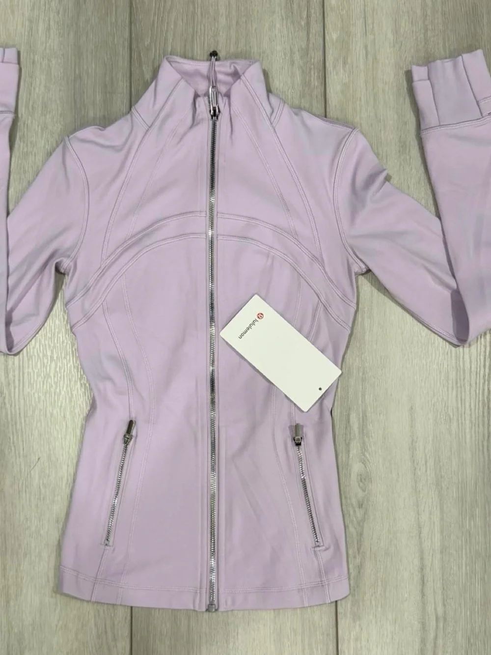 lululemon Define Jacket Nulu in Lilac with Accent Silver Mirror Zippers.